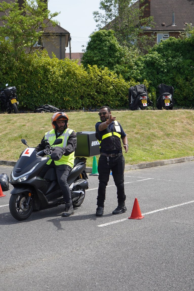 Instructor briefing a group of trainees - Universal Motorcycle Training Eltham centre